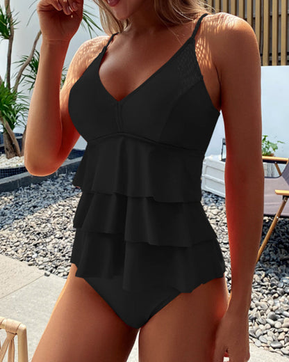 Split tankini with ruffles in solid colour